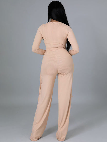 Top con cuello en V y pantalones largos con cordones irregulares de dos piezas