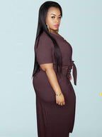 Conjunto de falda con bolsillo y top con nudo torcido y botones de talla grande de 2 piezas 